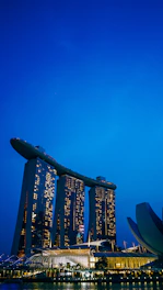 Compass and navigation tools overlaying a futuristic city skyline at dawn.