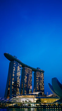 Compass and navigation tools overlaying a futuristic city skyline at dawn.