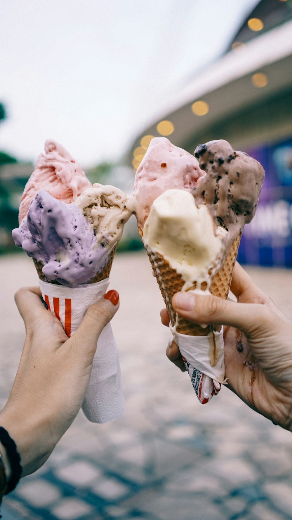 person holding ice cream cone