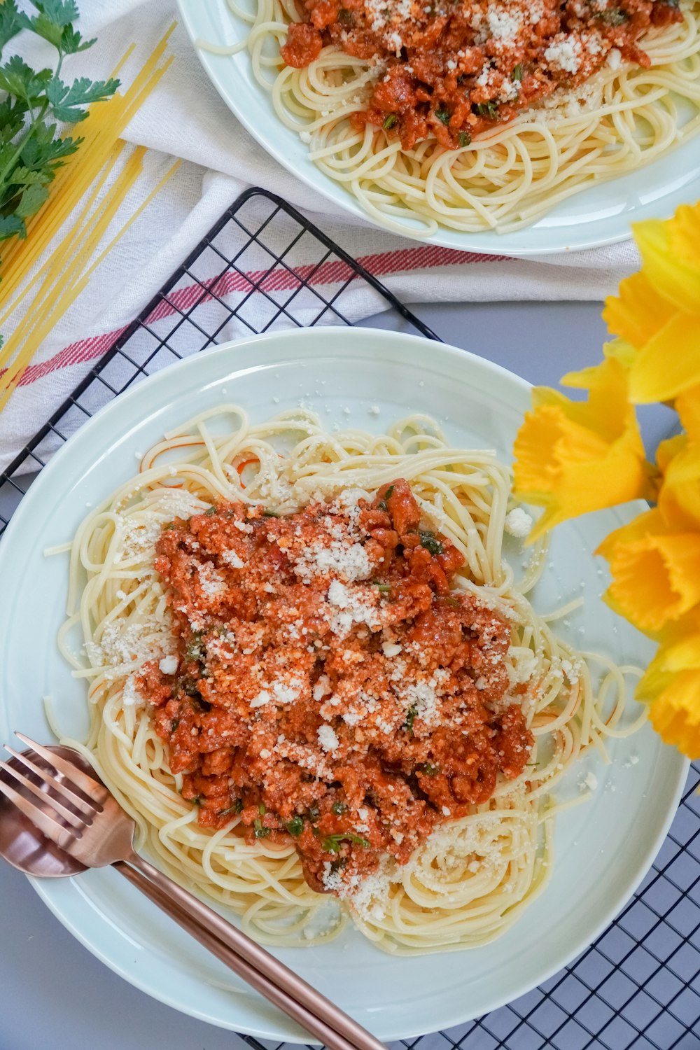 pasta with sauce on white ceramic plate