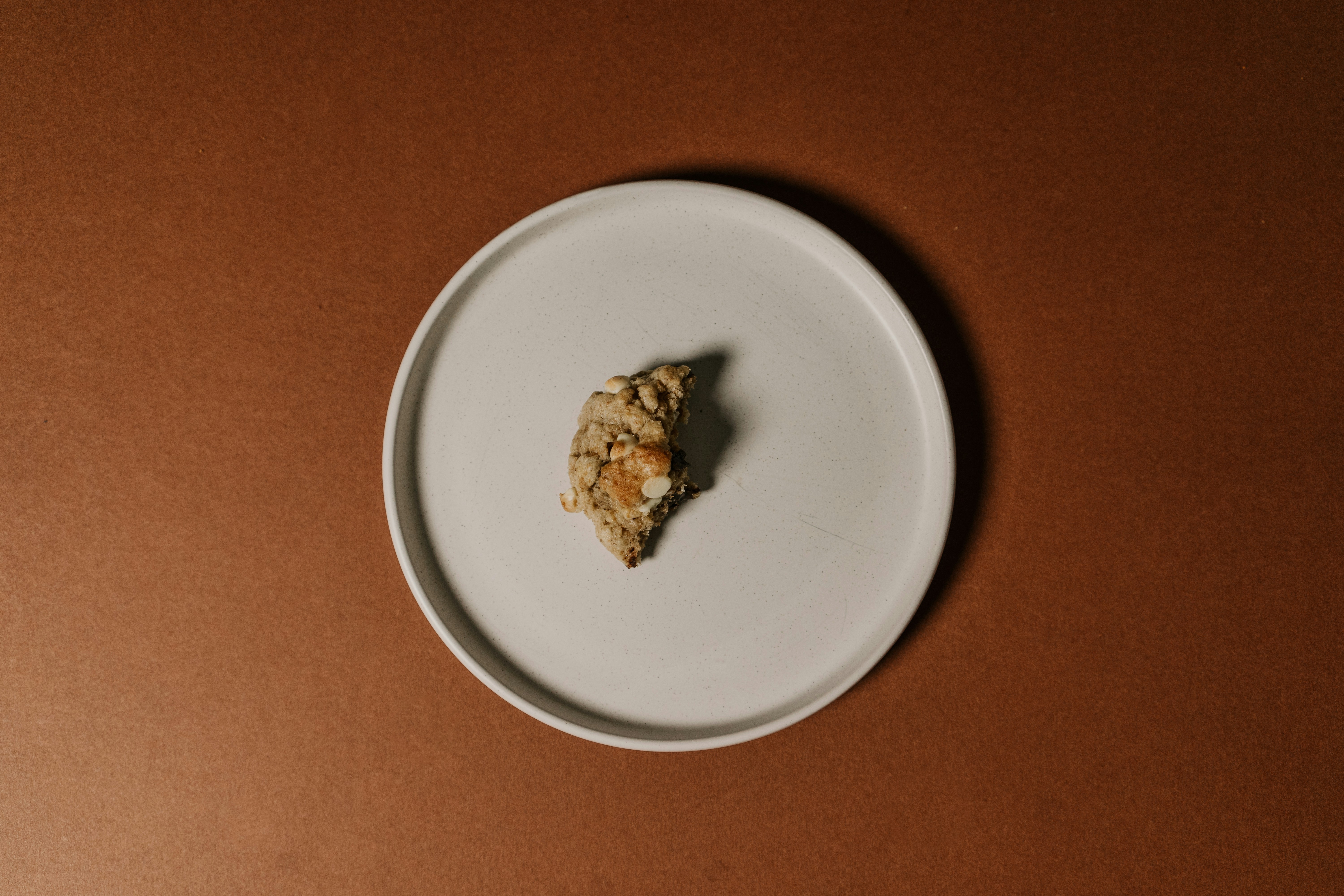 brown food on white ceramic plate