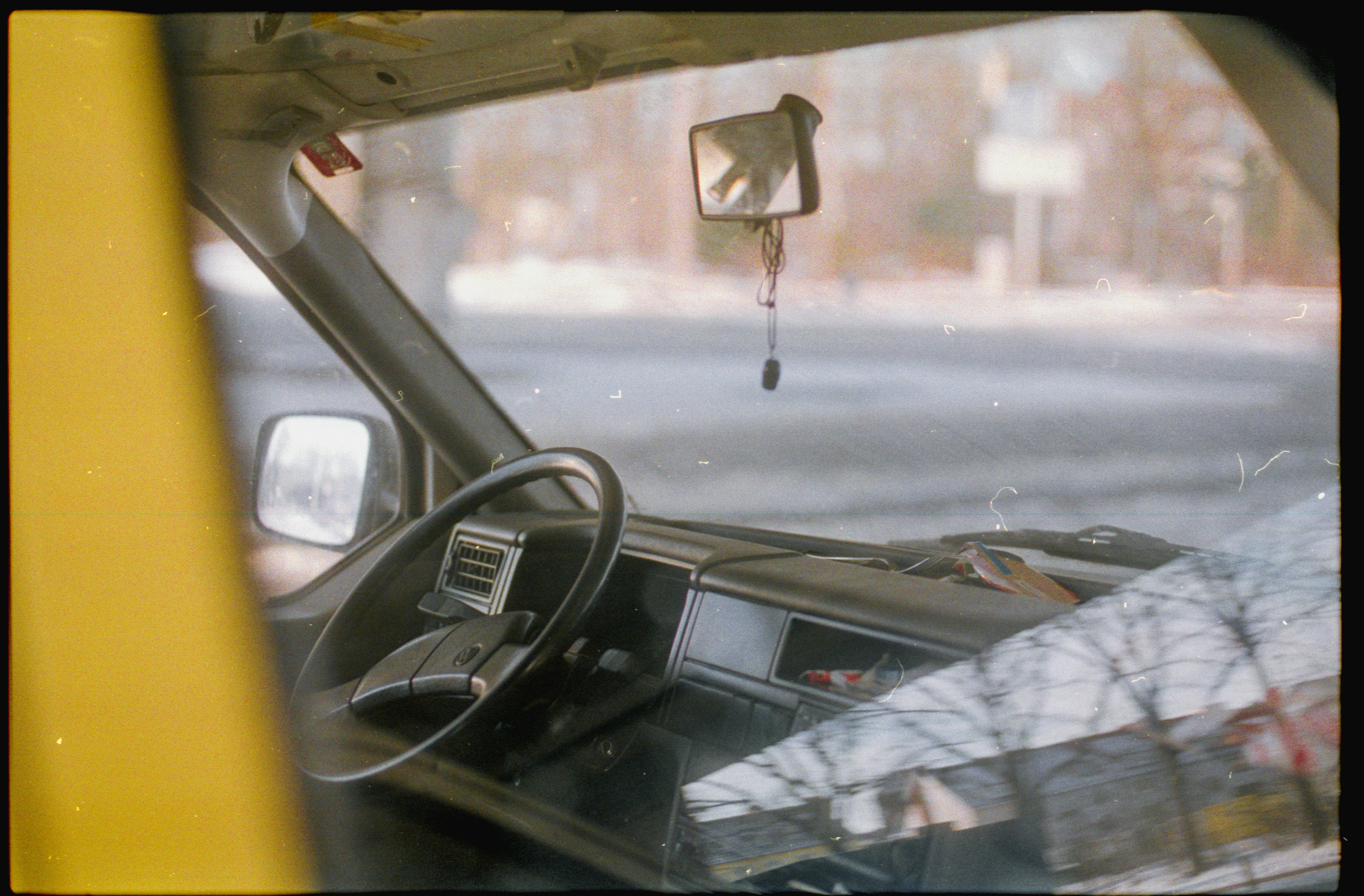 Windshield of an old yellow VW Bus