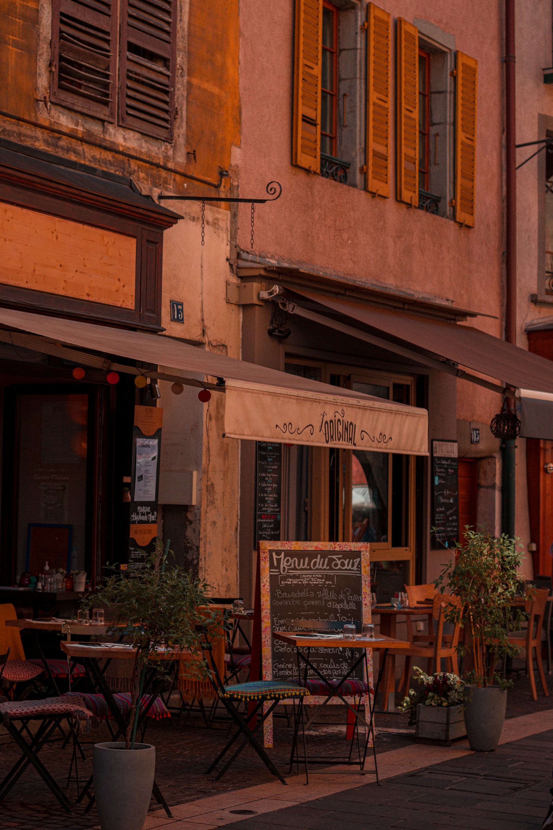 woman wearing yellow long-sleeved dress under white clouds and blue sky during daytime