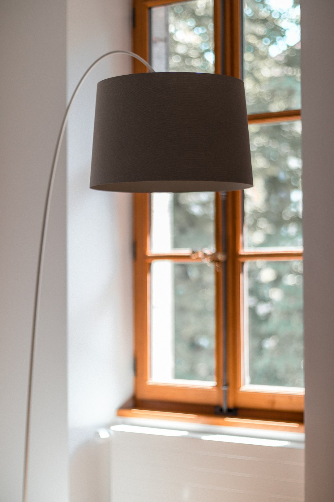 black pendant lamp near window