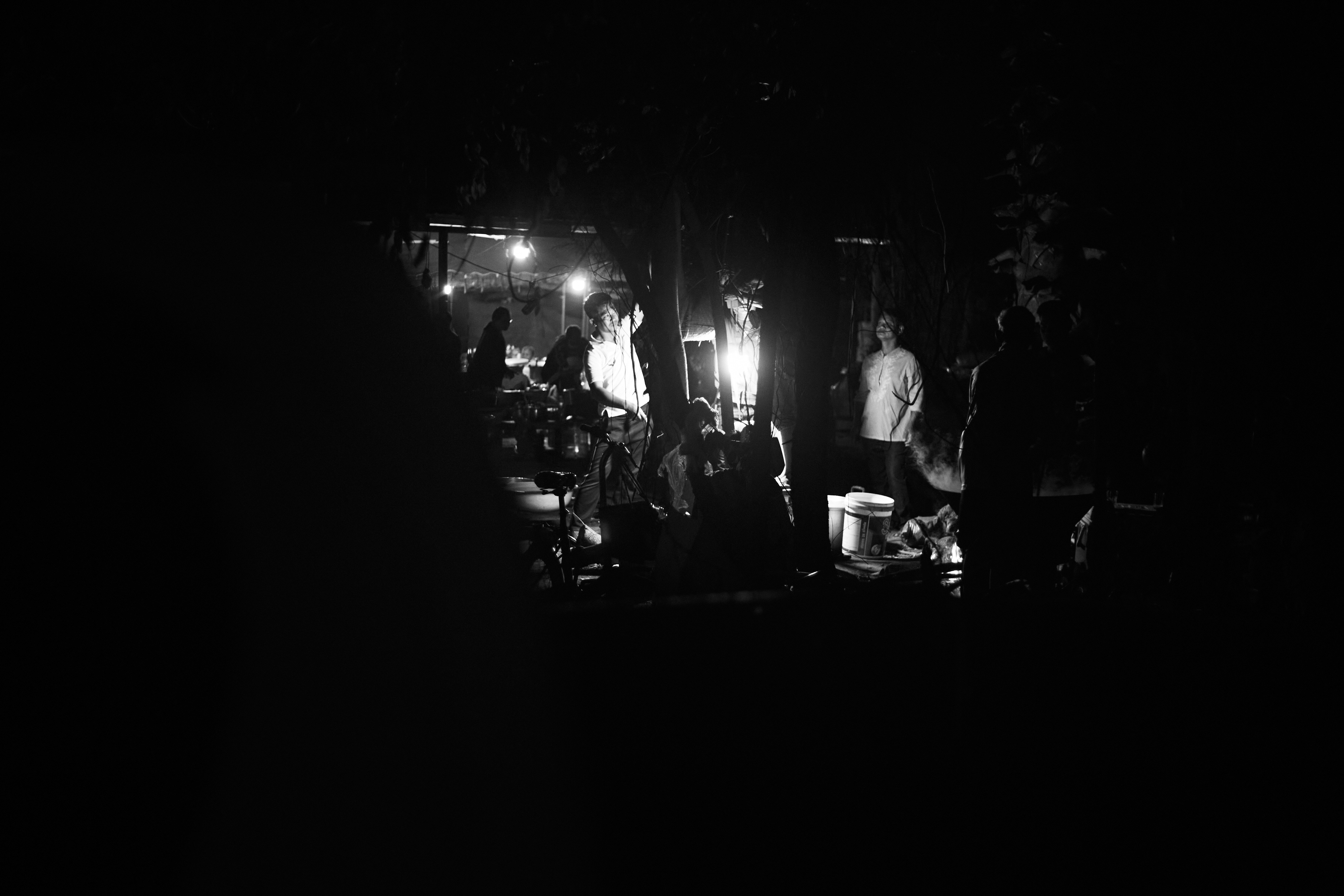 grayscale photo of people in a concert