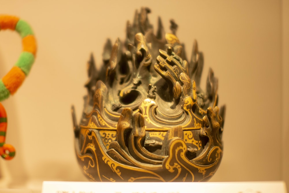 gold and black dragon figurine