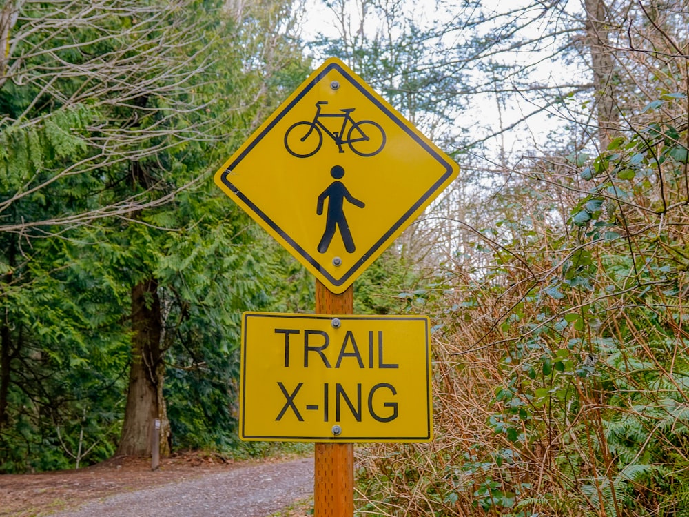 yellow and black road sign