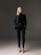 woman in black long sleeve shirt and black pants