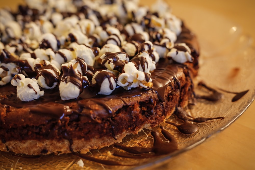 chocolate cake with white icing on top