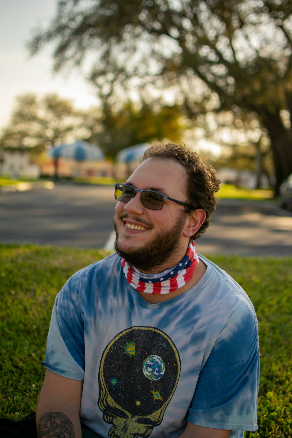 man in blue and white crew neck shirt wearing black framed eyeglasses