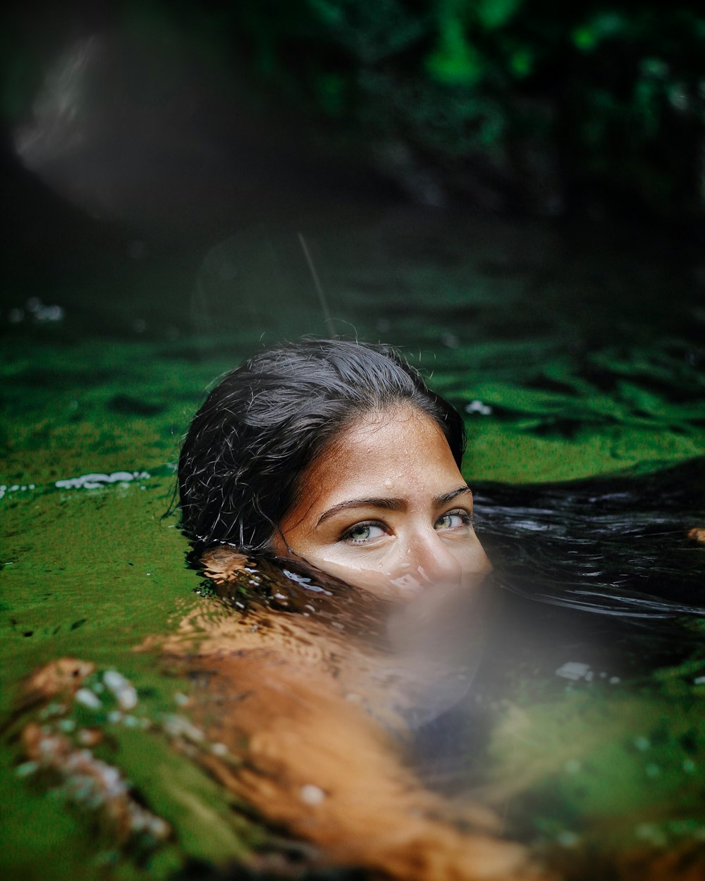 woman in water in close up photography