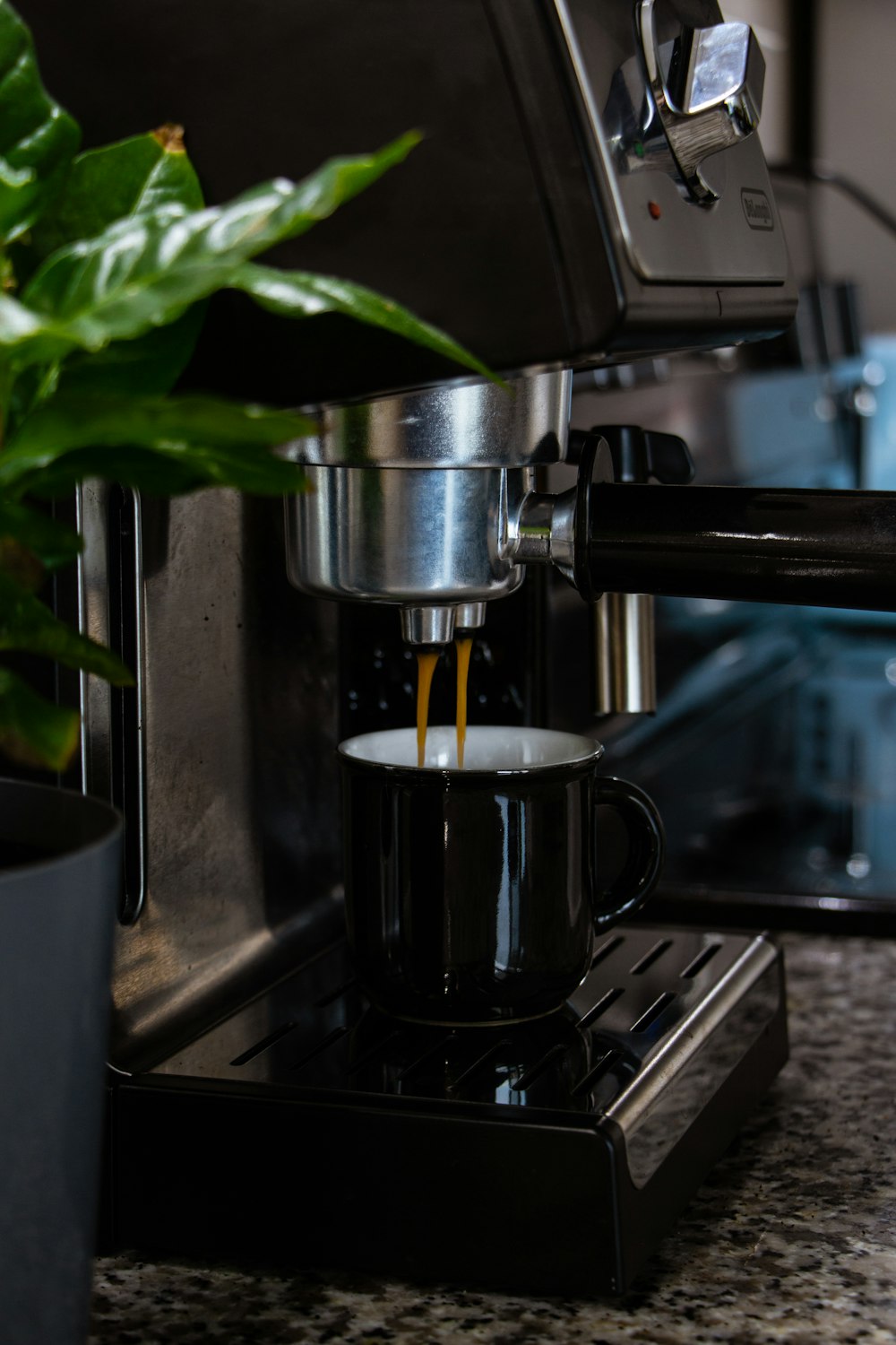 black and silver coffee maker