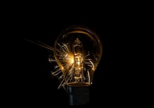 a light bulb that is turned on in the dark