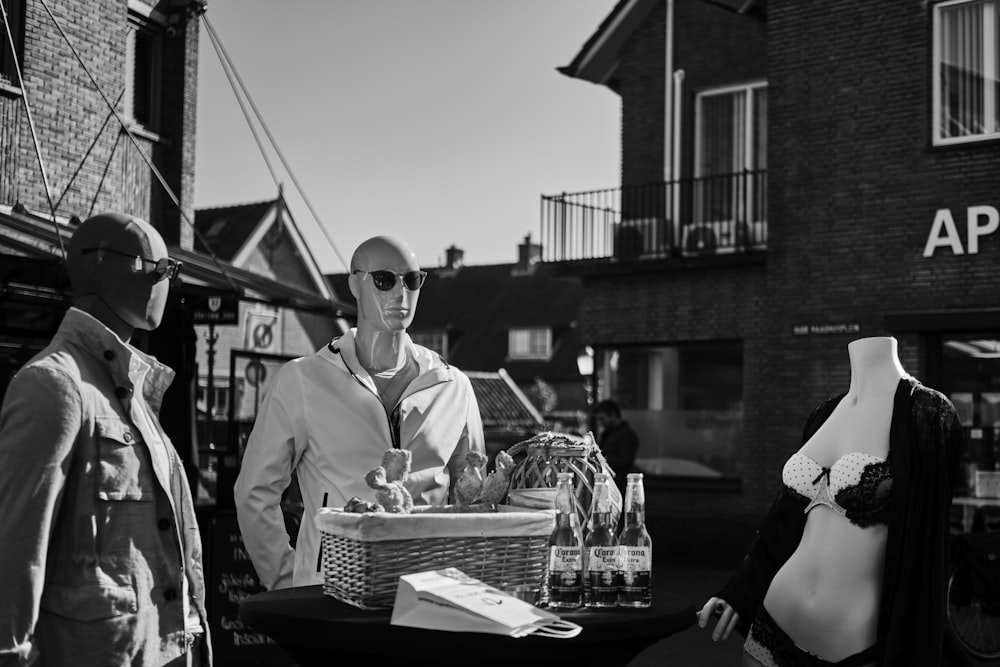 grayscale photo of man in white button up shirt and black sunglasses