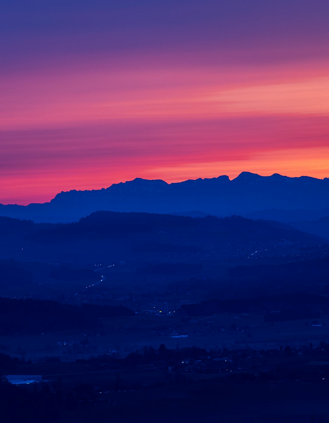 silhouette of mountains during sunset