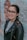 woman in black leather jacket wearing black framed eyeglasses