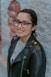 woman in black leather jacket wearing black framed eyeglasses