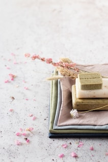 brown book on white textile