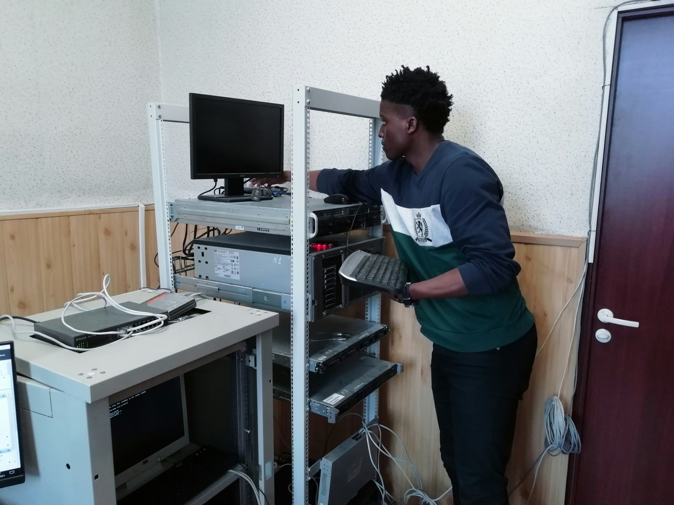 IT professional working on server maintenance and troubleshooting