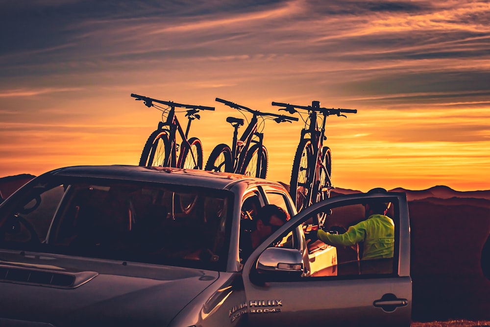 silhouette of bicycle on car