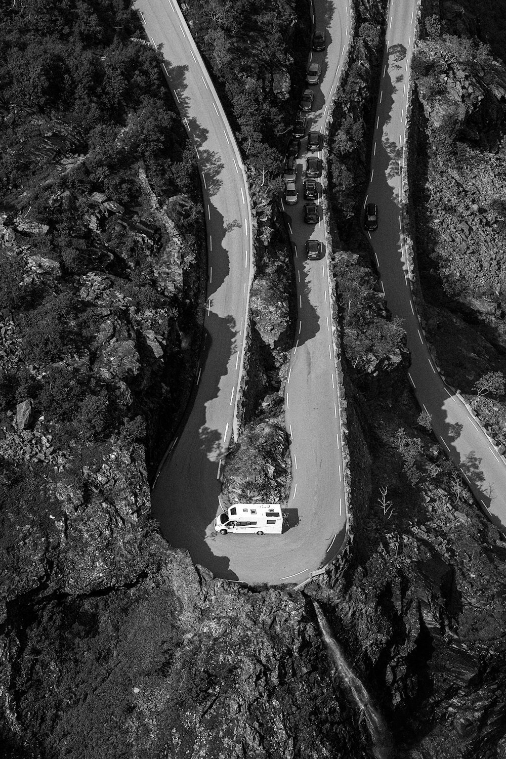 grayscale photo of a bridge