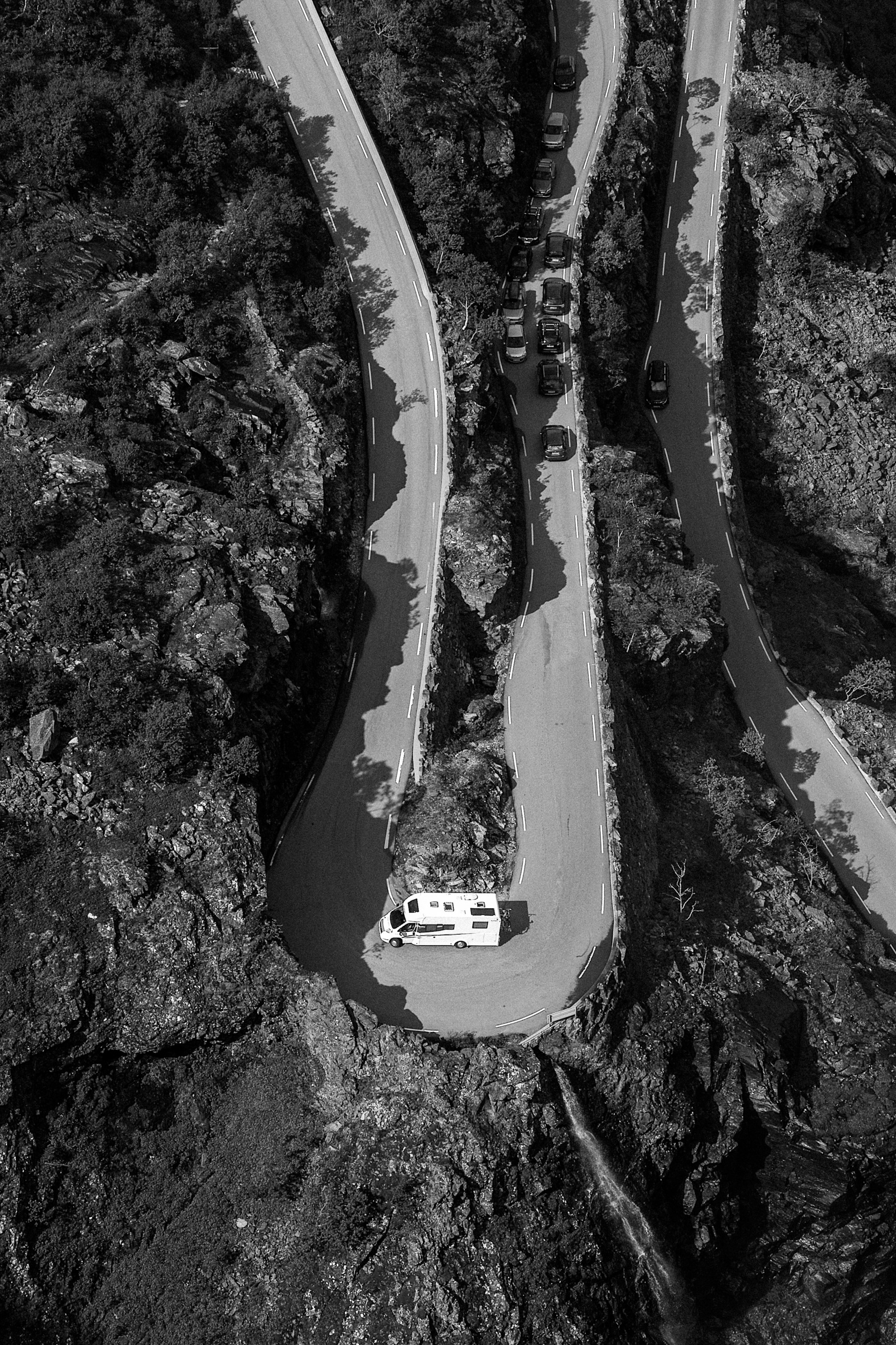 woman wearing yellow long-sleeved dress under white clouds and blue sky during daytime