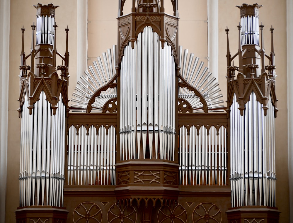 brown wooden framed white and gold cathedral