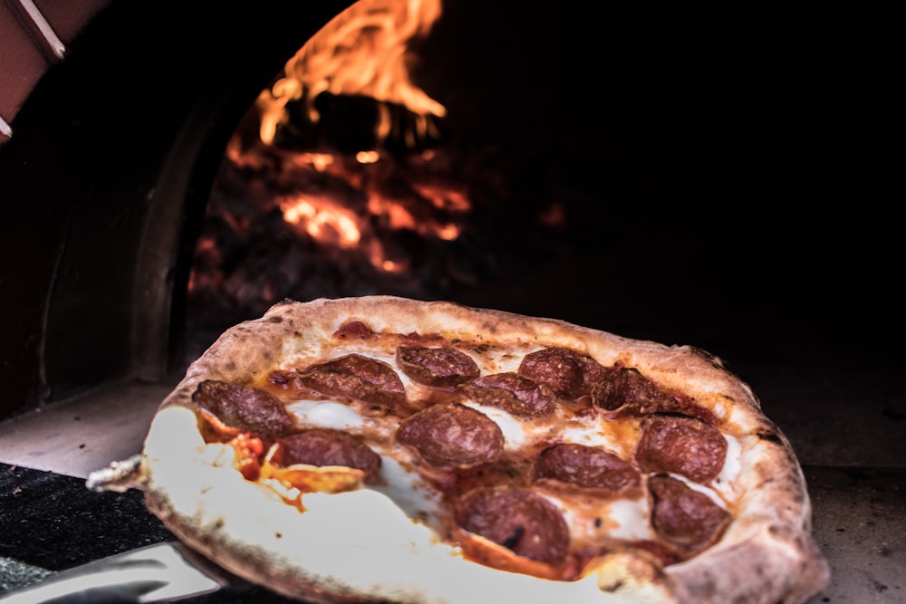 pizza on white ceramic plate