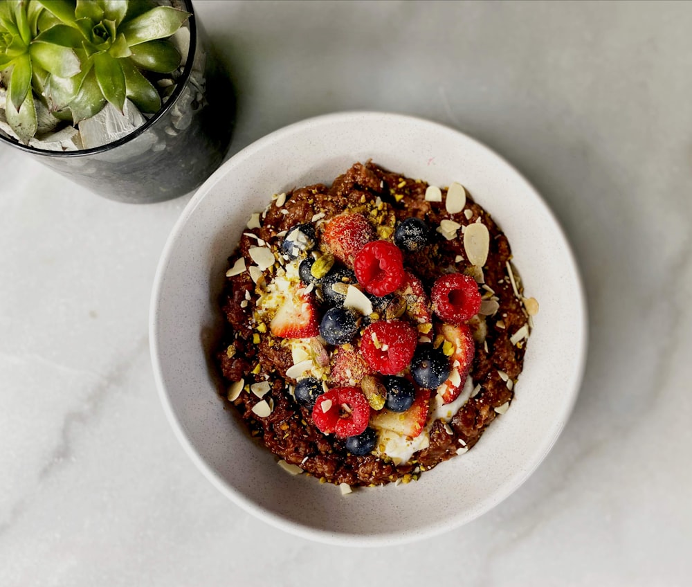 fruit salad on white ceramic bowl