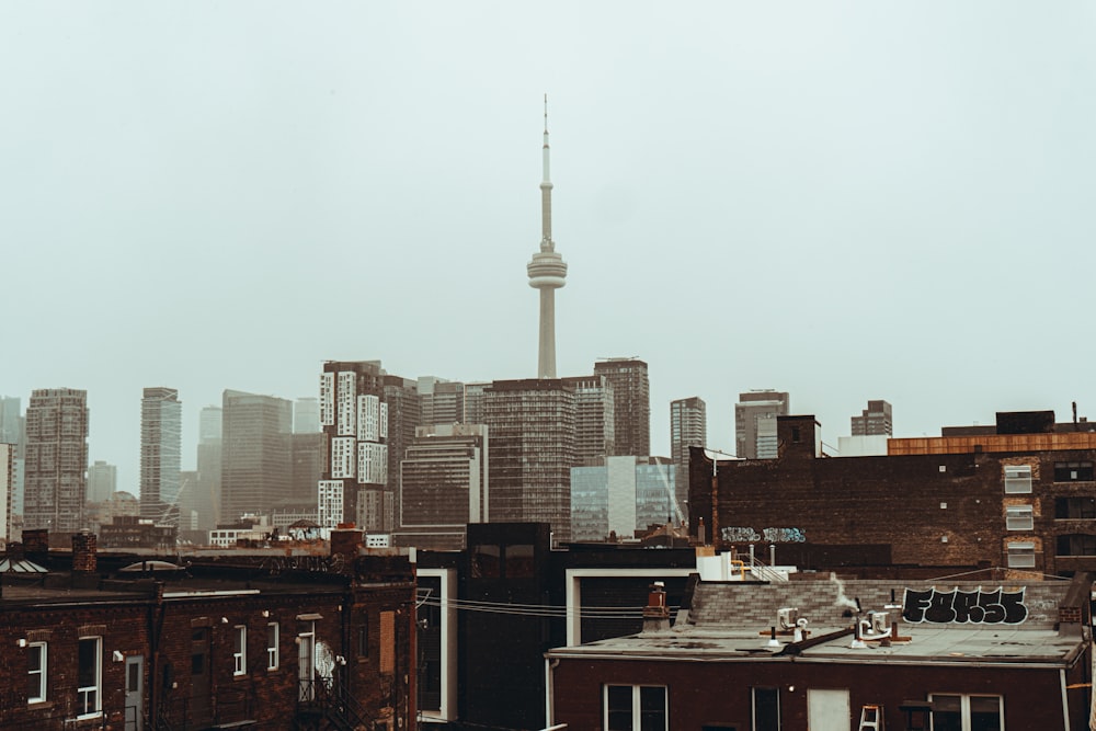 city skyline under white sky during daytime