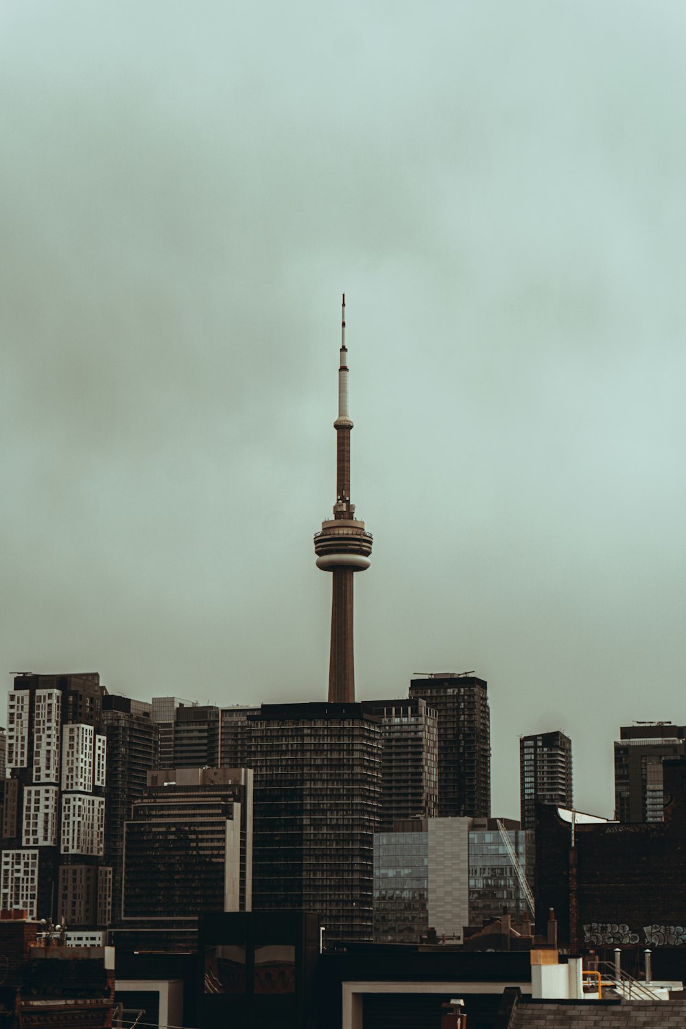 high rise buildings under gray sky