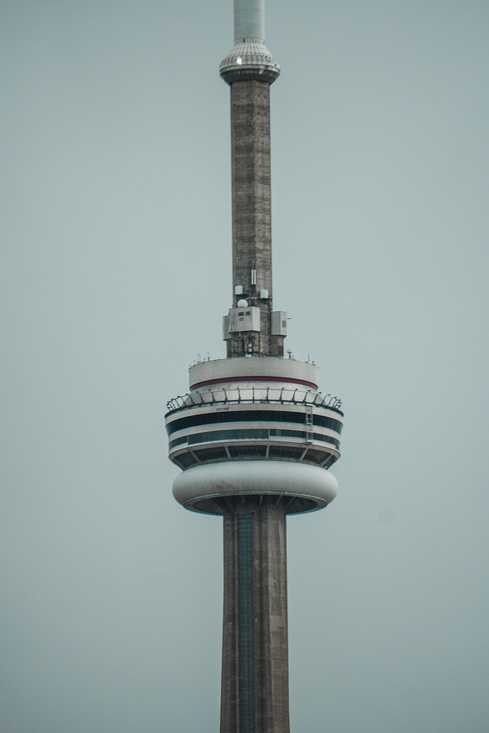 brown and white tower under white sky