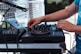 person playing black and white dj turntable