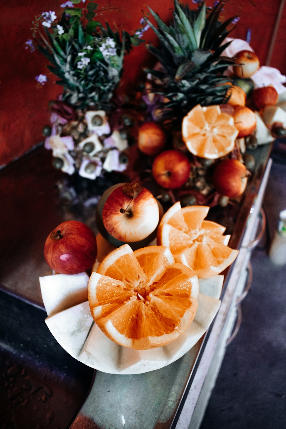 sliced orange fruit on white ceramic plate