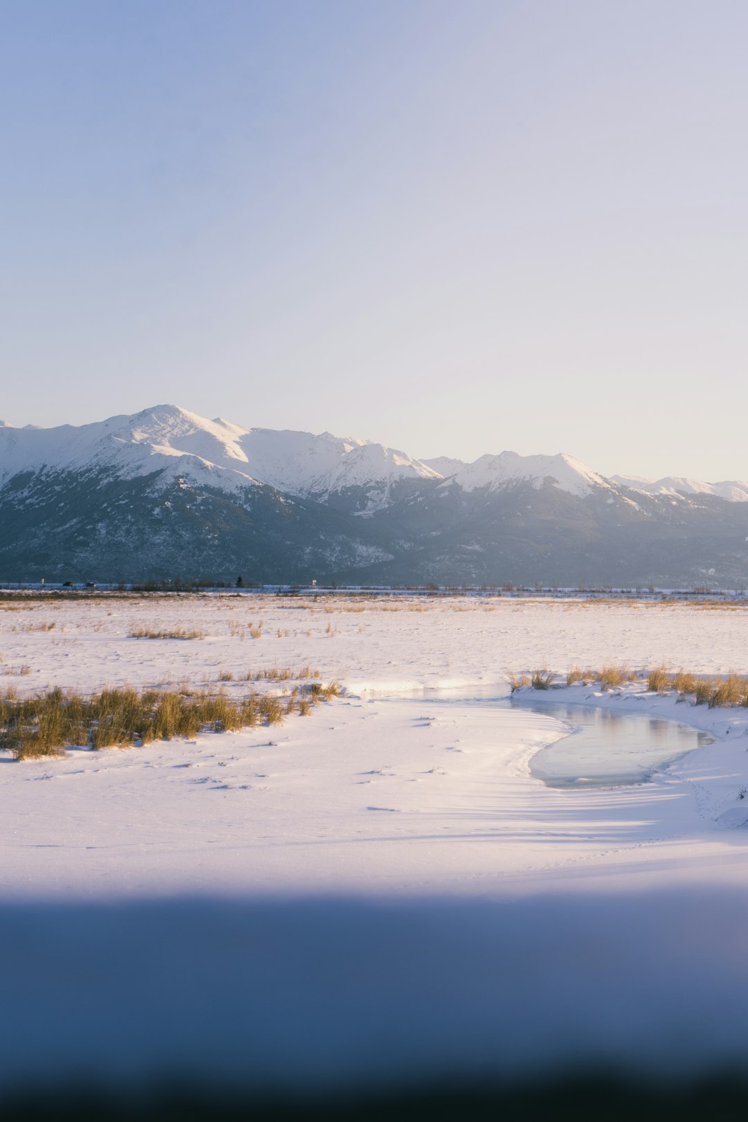 snow covered mountain during daytime