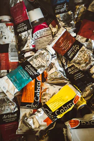 assorted food packs on white and black textile