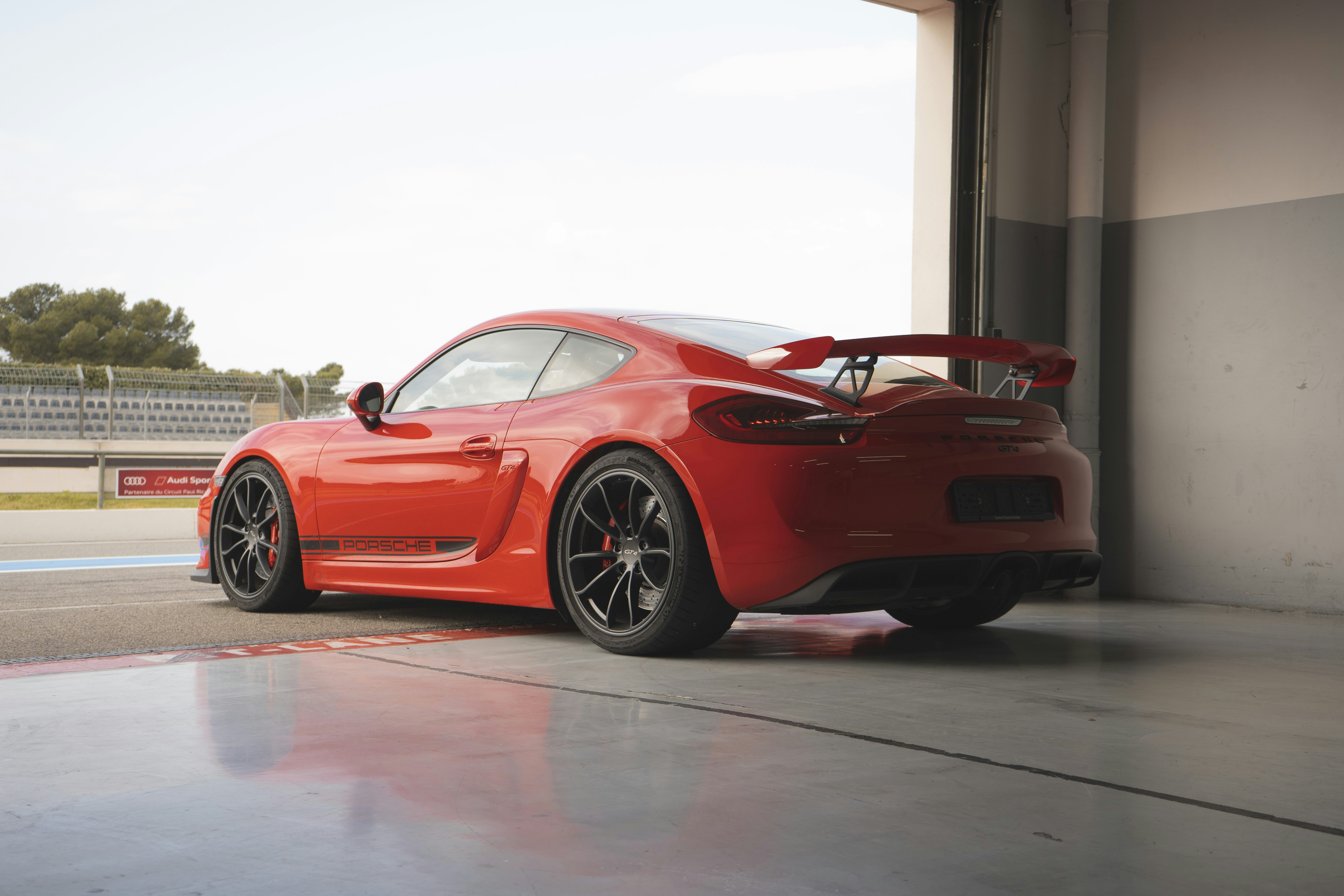 Red Porsche GT4 at Circuit Paul Ricard (french track) - 2