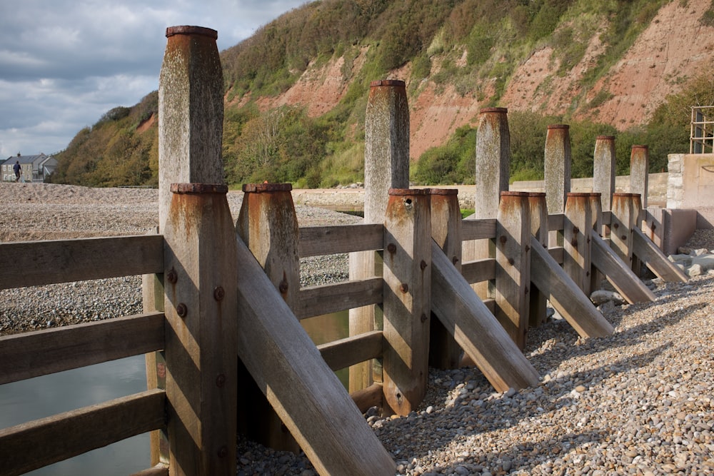 brown wooden fence on hill