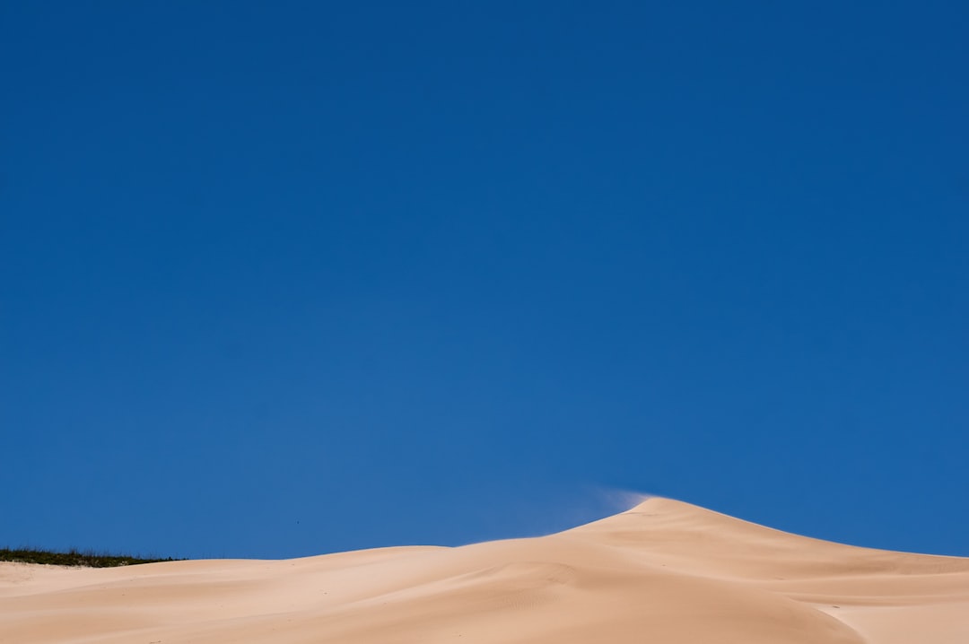 desert under blue sky during daytime