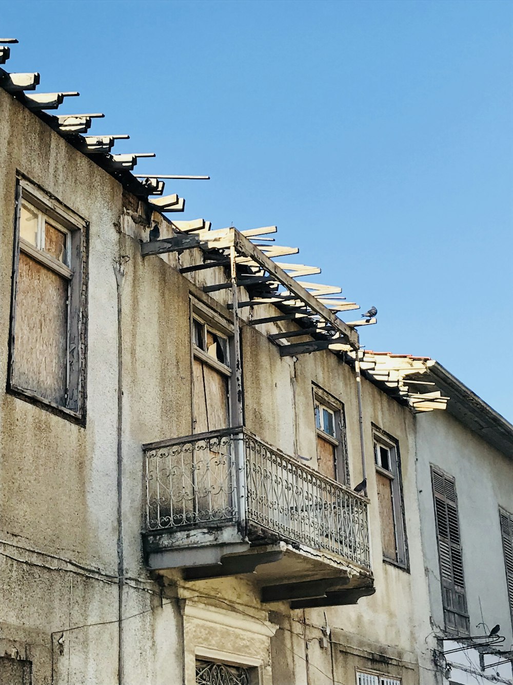 brown concrete building under blue sky during daytime