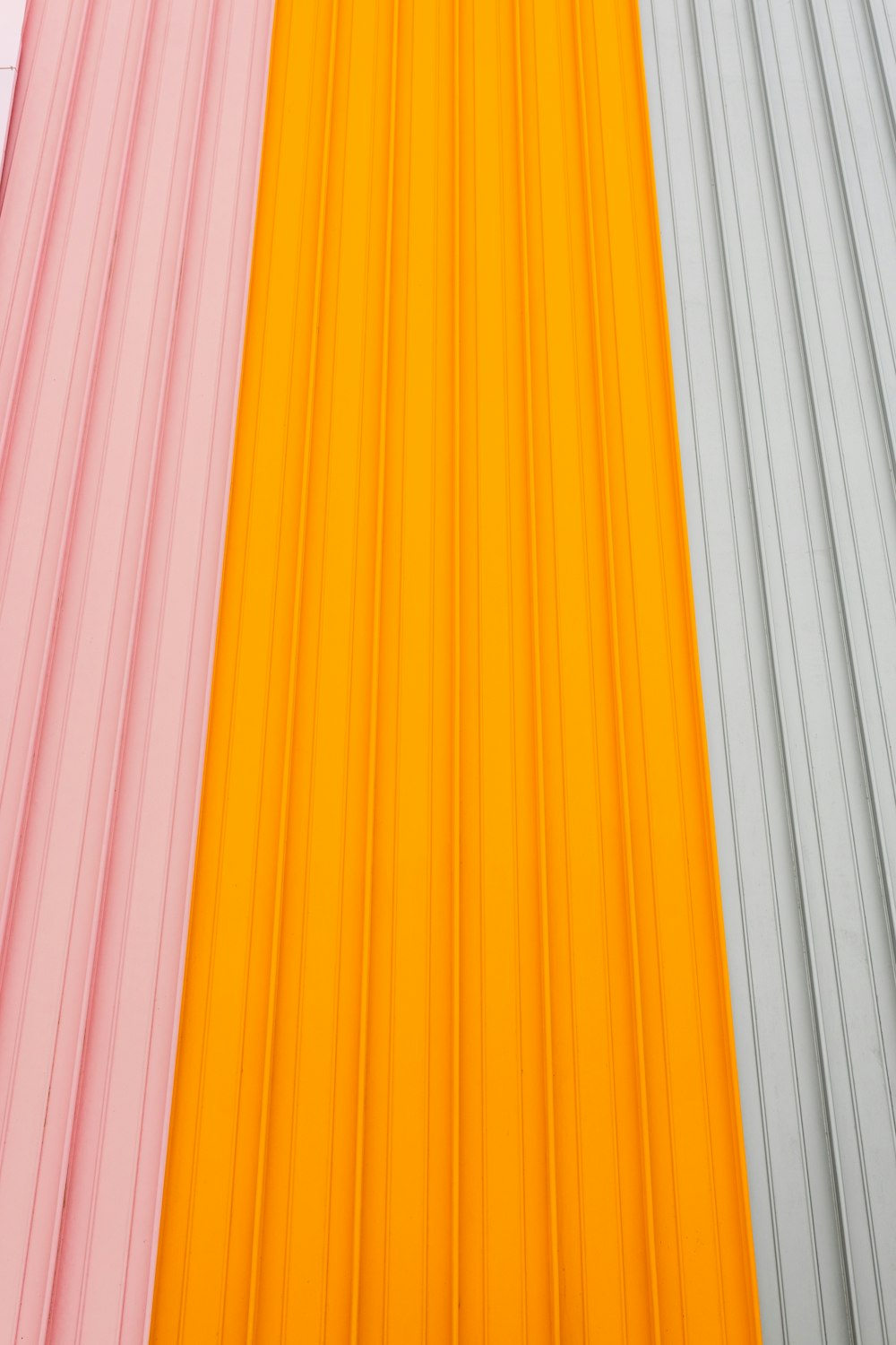 yellow red and purple striped textile