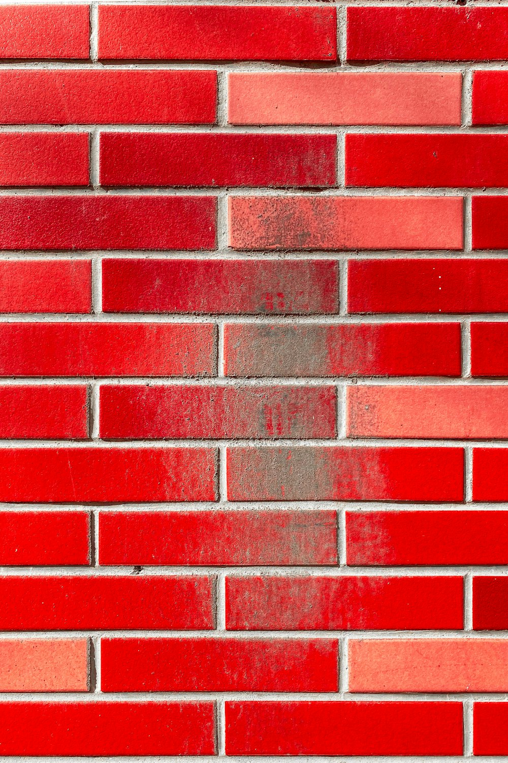 red brick wall during daytime