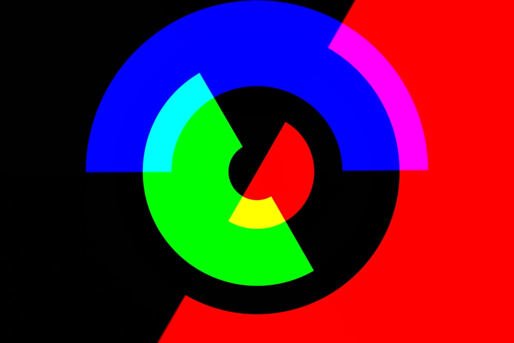 a multicolored circle with a black background