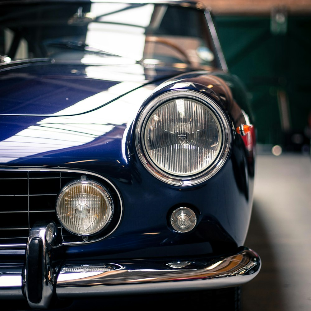 blue and silver car in close up photography