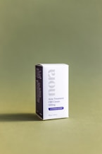 a small white box sitting on top of a table