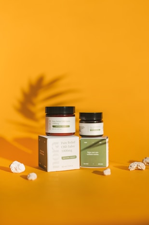 Packaging of Rincón Verde CBD products featuring earthy tones and tree bark textures.