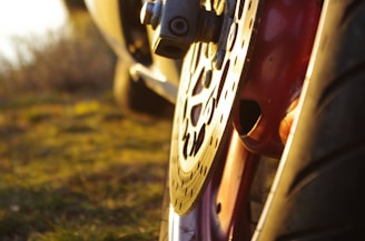 Close-up of a rugged Hilux brake disc shining under natural light.