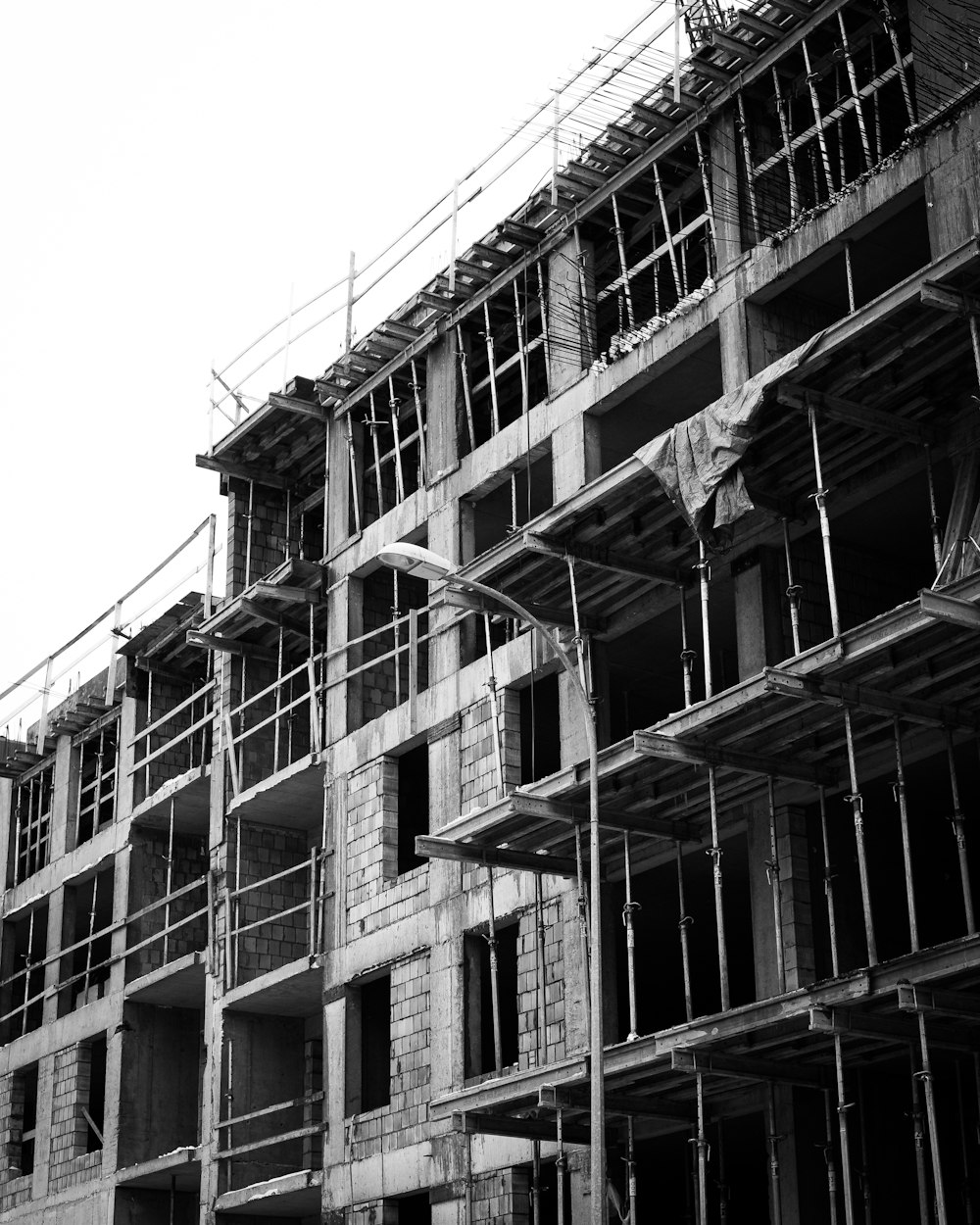 grayscale photo of concrete building