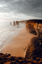 brown rock formation on sea shore during daytime