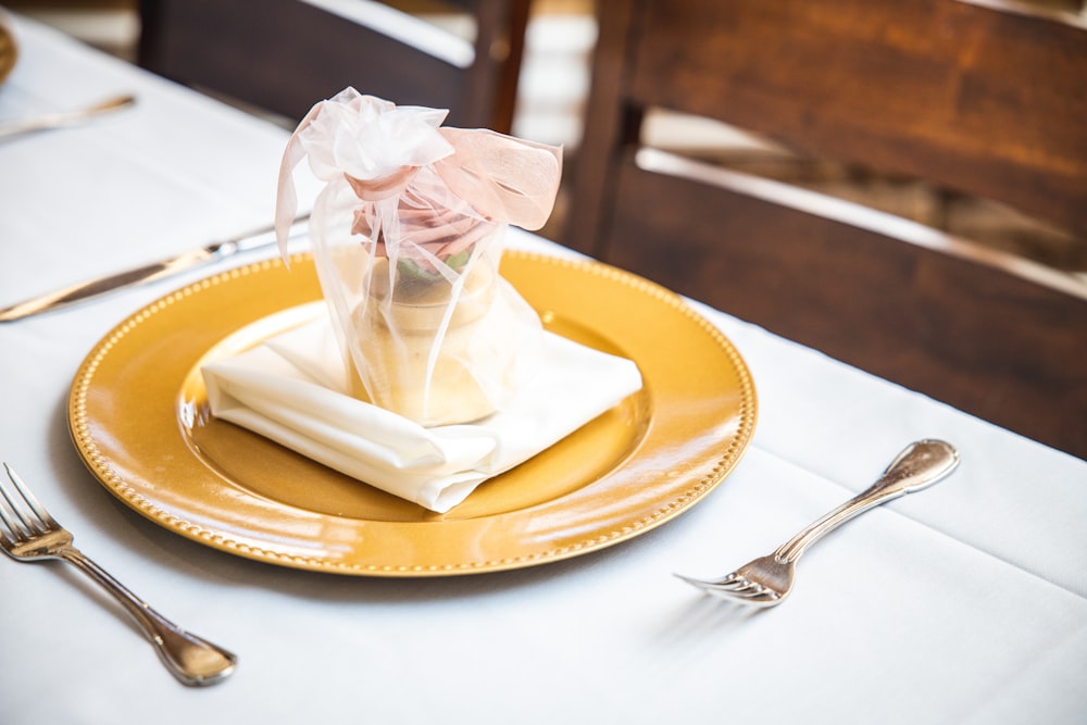 white tissue paper on white ceramic plate